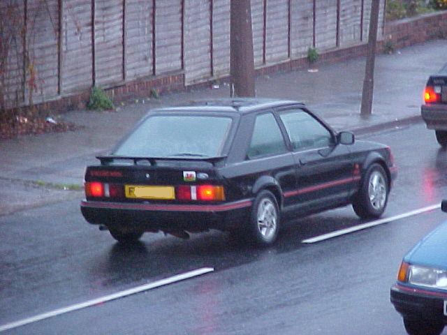 White Ford Escort, front and side