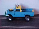 Blue plastic Land Rover on Scalextric chassis