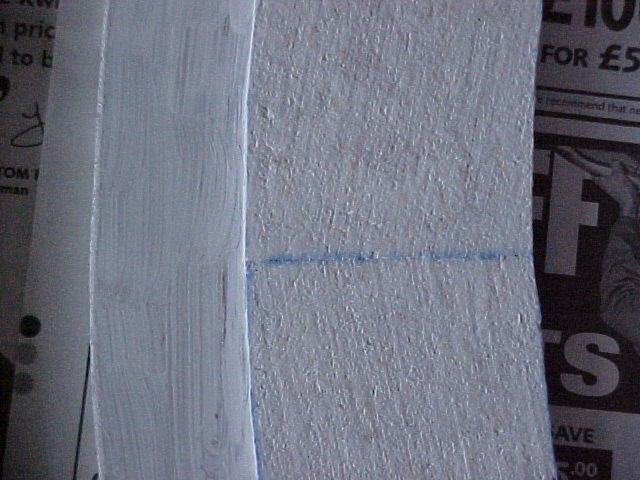 Blue line bleeding through white paint